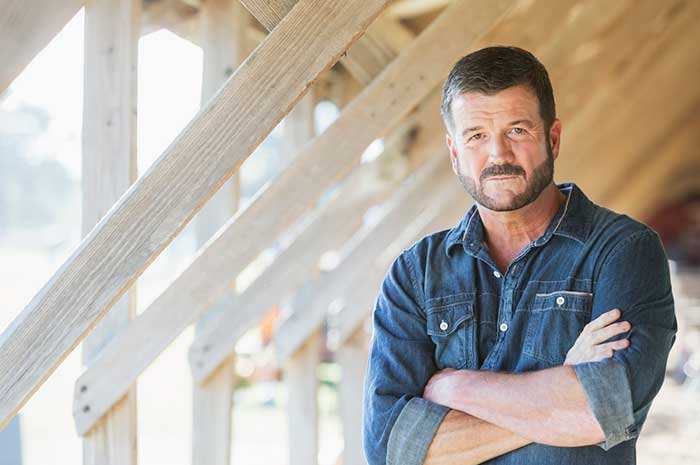 man in barn