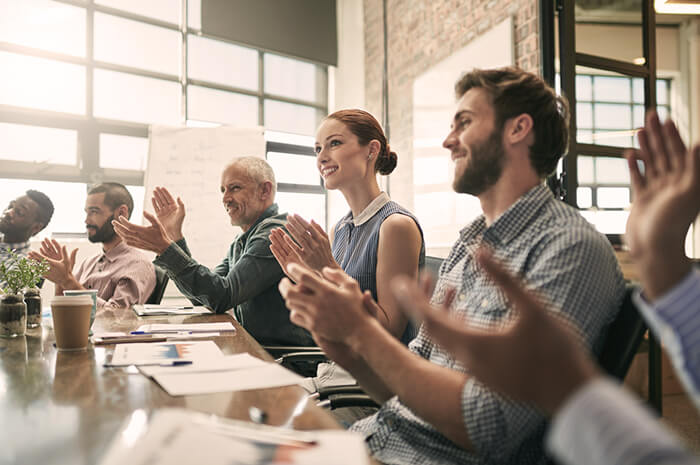 happy employees applauding