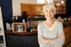 jubilant coffee shop owner