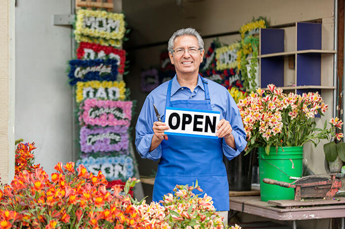 mature flower shop owner