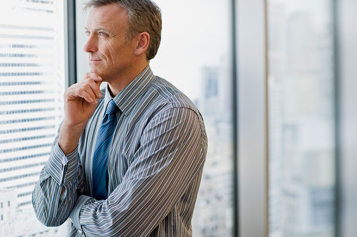 pondering businessman