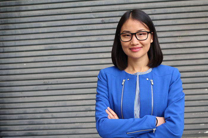 successful businesswoman in blue