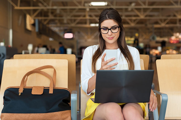 woman laptop airport